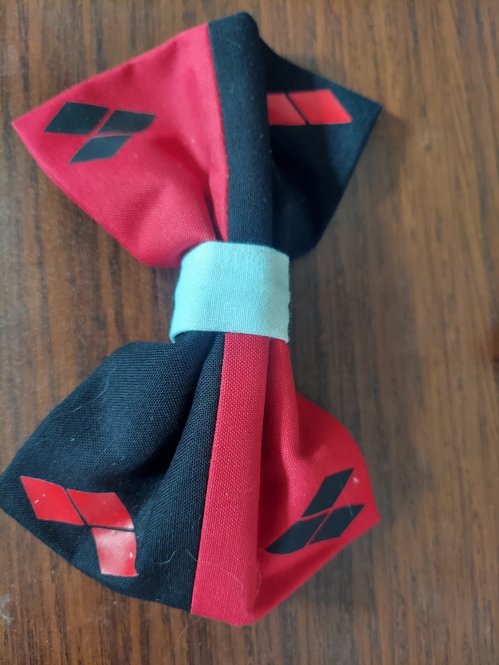 Harley Quinn Red & Black Bow Hair Clip with Light Blue Center